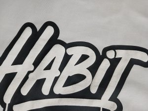 Suede Ink Print Luxury Streetwear Heavyweight T-Shirt for ODM/OEM Manufacturing White Print Closeup